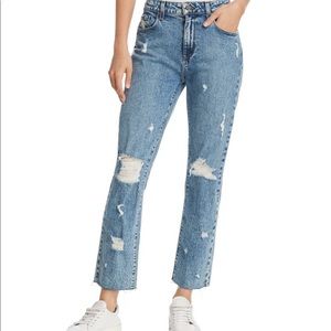 Light blue wash ripped boyfriend jeans